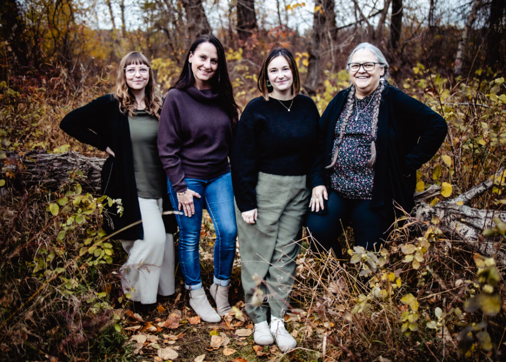 Local doula team gathered outdoors, showcasing community centered birth support in Edmonton.
